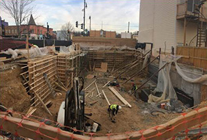 Workers in a Dug Site