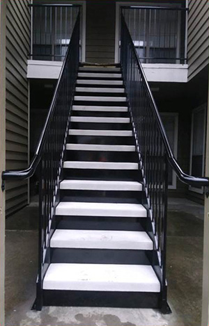 Welded Stair Railings with White Steps